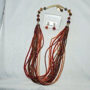 Ali Khan multi row cascade  in faceted glass beads with neck/ear set in gift box